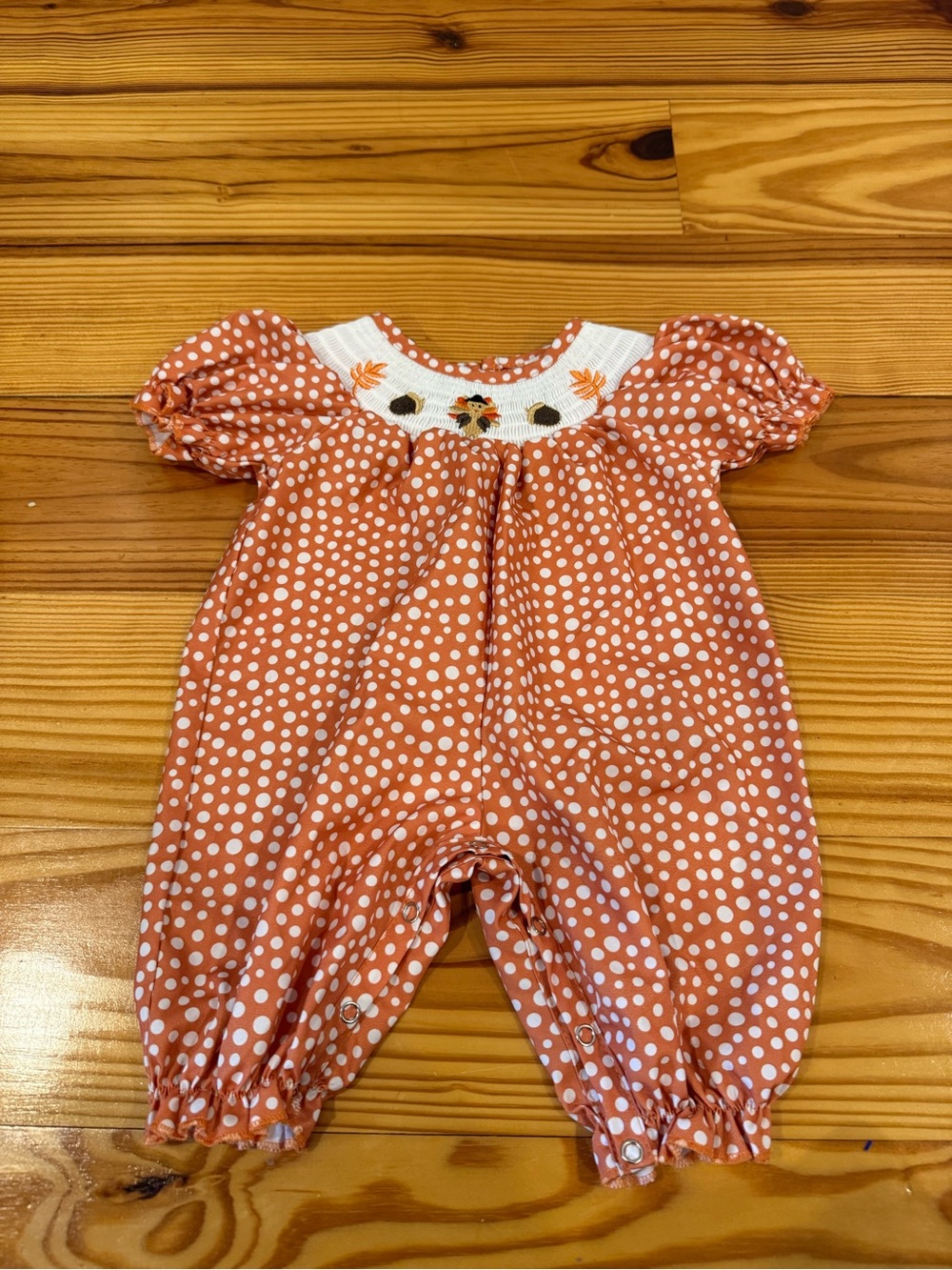 Orange Polka Dot Smocked Baby One-Piece